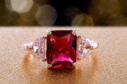 Radiant and Half Moon Shaped Simulated Ruby and Cubic Zirconia Ring in Rose Gold Plated Silver