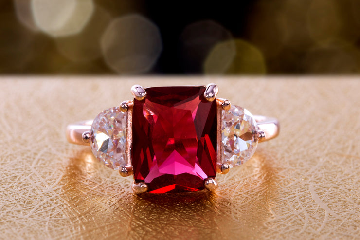 Radiant and Half Moon Shaped Simulated Ruby and Cubic Zirconia Ring in Rose Gold Plated Silver
