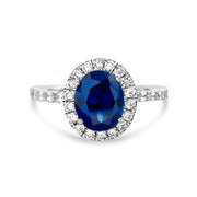 Simulated Gemstone and Cubic Zirconia Halo Ring in Rhodium Plated Sterling Silver